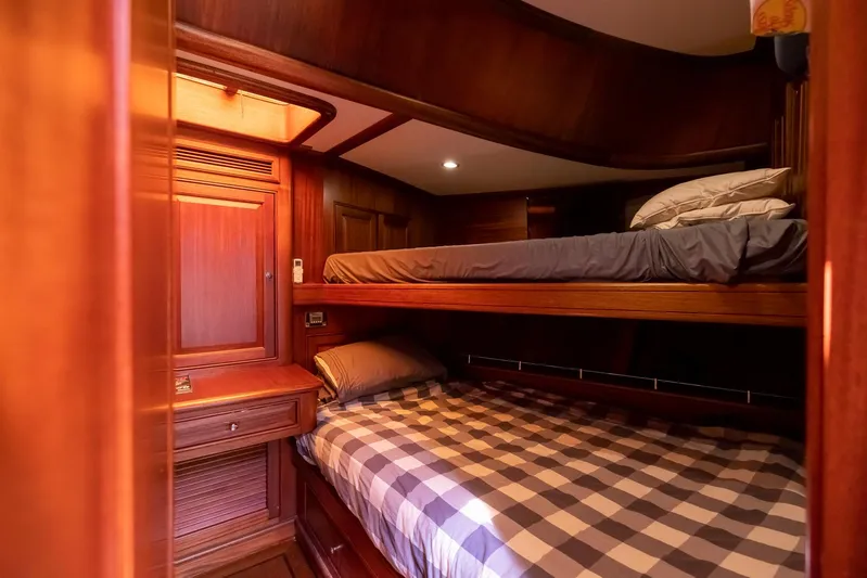 Essence Yacht Photos Pics Luxurious wooden cabin interior with bunk beds on 2006 Vicem 85 Classic yacht.