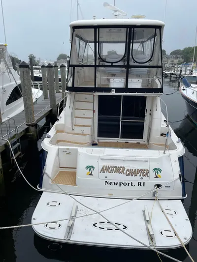 Another Chapter Yacht Photos Pics 1999 Sea Ray 480 Sedan Bridge yacht docked in Newport, RI marina.