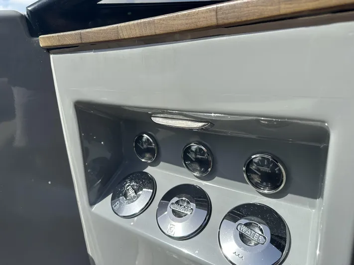 Rand Leisure 28 Yacht Photos Pics Control panel of 2021 Rand Leisure boat with gauges and switches.