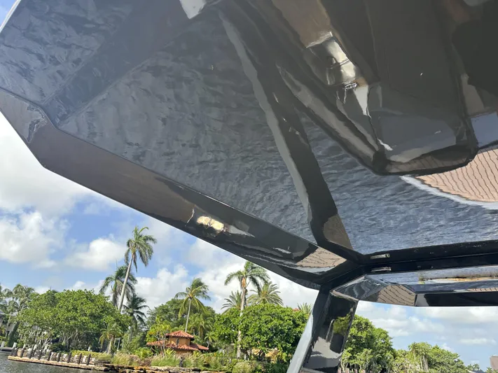 Rand Leisure 28 Yacht Photos Pics 2021 Rand Leisure boat canopy with tropical background and palm trees.