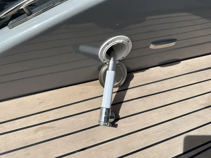 Rand Leisure 28 Yacht Photos Pics Boat deck with retractable hose on Rand Leisure, 2021 model.