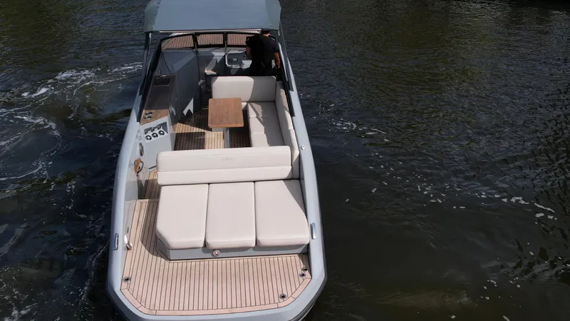 Rand Leisure 28 Yacht Photos Pics 2021 Rand Leisure boat with spacious seating on calm water.