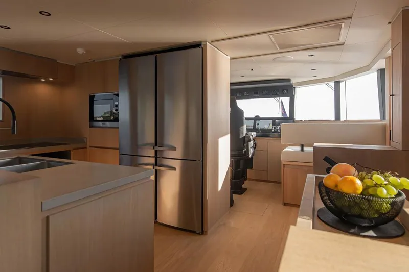Crossover 27 #1 Yacht Photos Pics Modern kitchen interior on 2024 Lynx Crossover 27 yacht with stainless steel appliances.