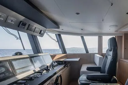 Crossover 27 #1 Yacht Photos Pics 2024 Lynx Crossover 27 yacht interior with modern navigation controls and ocean view.