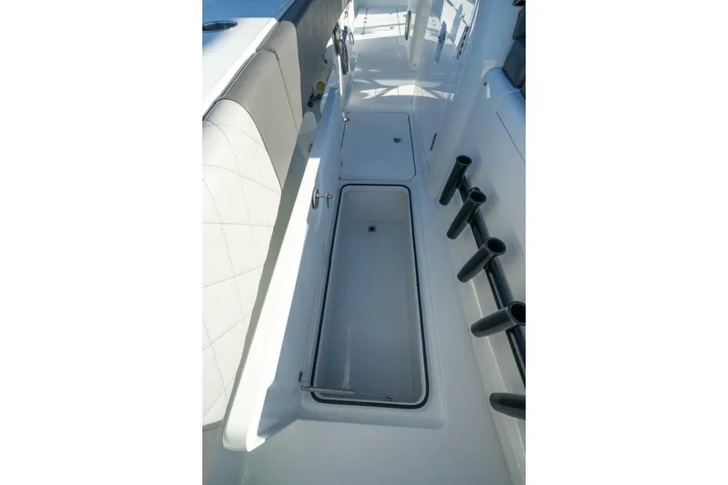 Full Send Yacht Photos Pics 2024 Freeman 38 boat interior with storage compartments and rod holders.