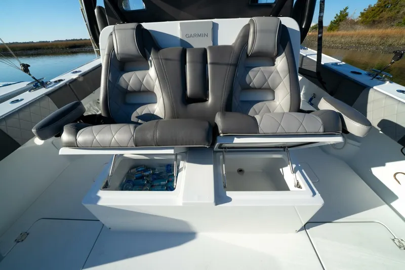 Full Send Yacht Photos Pics 2024 Freeman 38 boat interior with luxury seating and storage compartments.