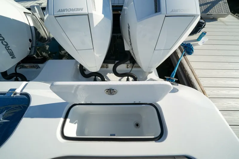 Full Send Yacht Photos Pics 2024 Freeman 38 boat with dual Mercury outboard engines at dock.
