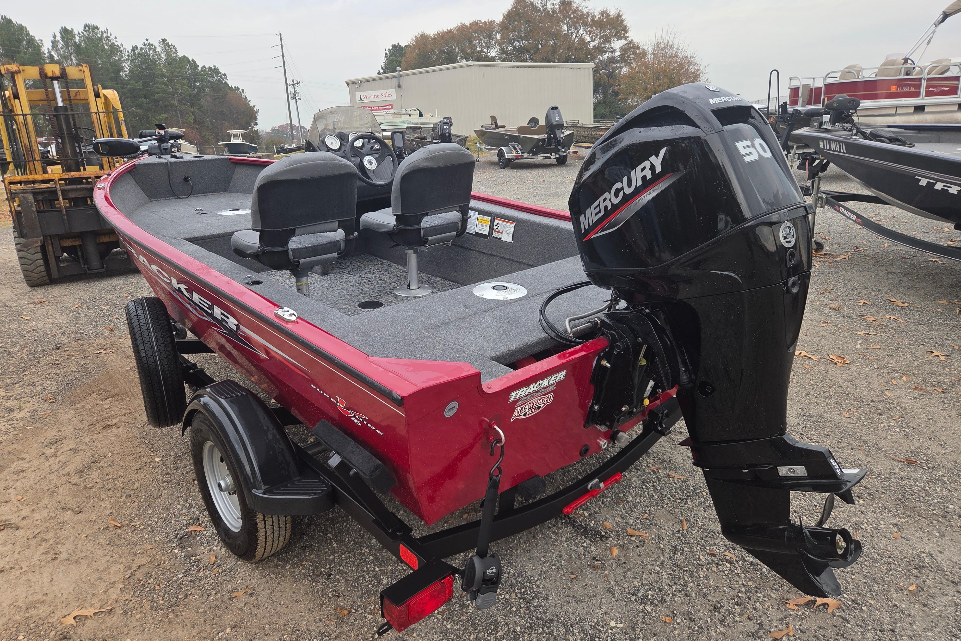 2025 Tracker Super Guide V-16 SC boat with Mercury 50 engine on trailer.