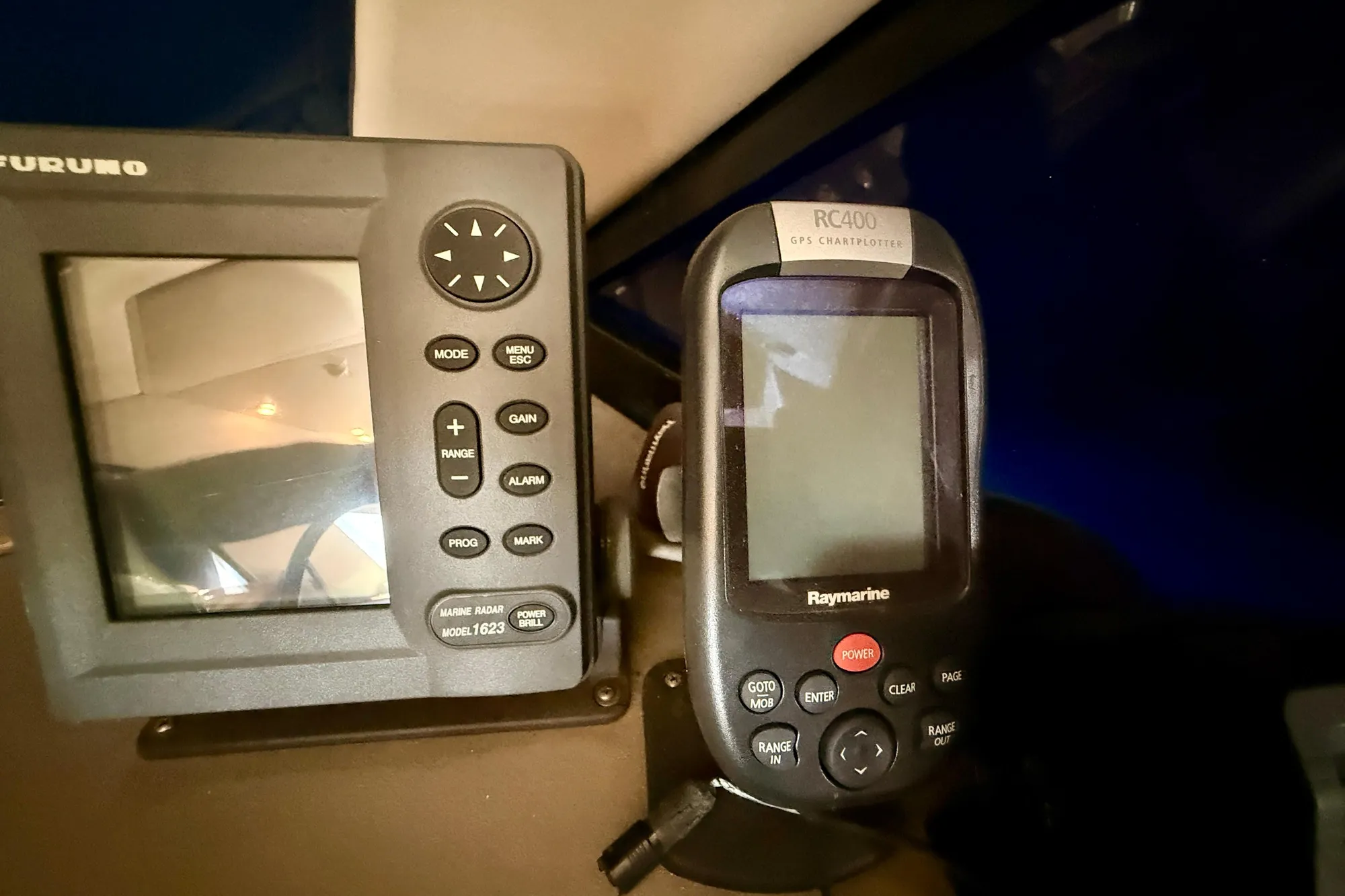 1998 Bayliner 3988 Command Bridge Motoryacht dashboard with Furuno radar and Raymarine GPS.