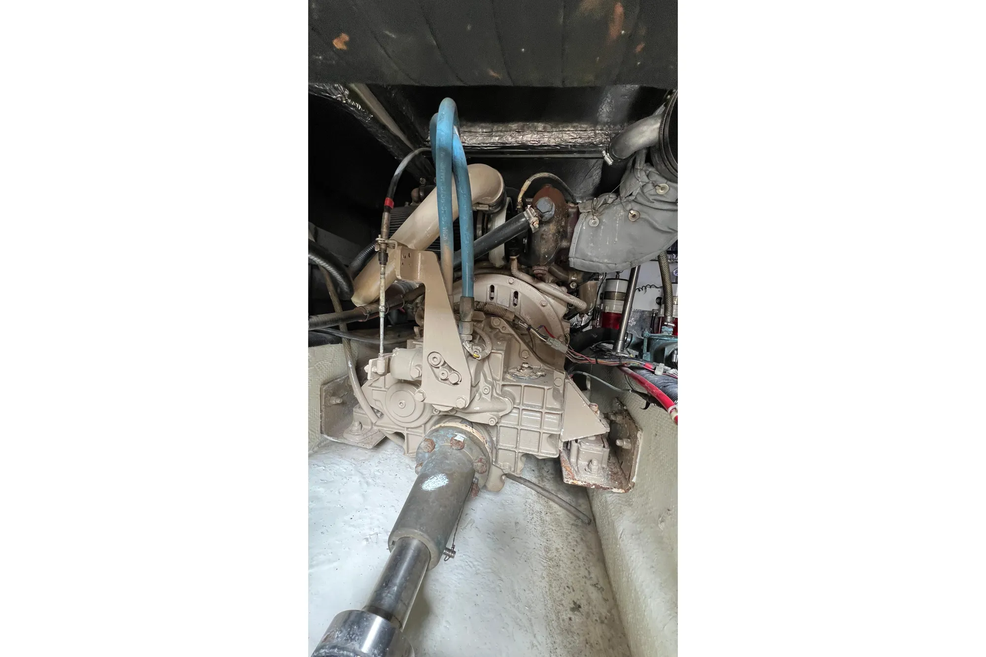 Engine compartment of 1998 Bayliner 3988 Command Bridge Motoryacht, showcasing mechanical components.