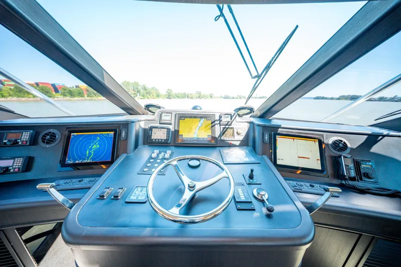  Yacht Photos Pics Cockpit of 1998 Donzi R73 yacht with advanced navigation systems and steering wheel.