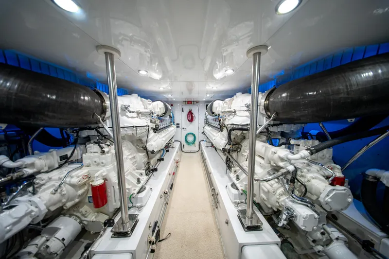  Yacht Photos Pics Engine room of a 1998 Donzi R73 yacht, featuring dual powerful engines.