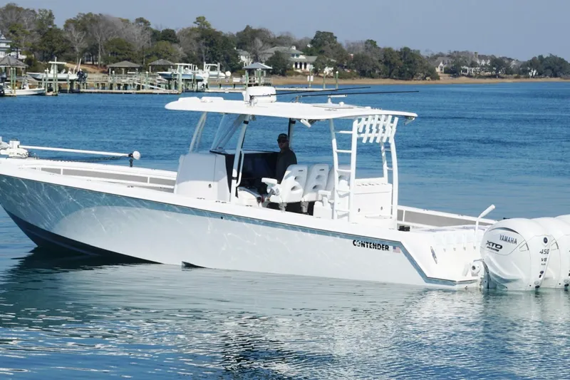  Yacht Photos Pics 2024 Contender 39 ST boat on calm water with Yamaha engines.