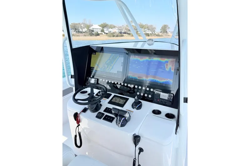  Yacht Photos Pics 2024 Contender 39 ST boat dashboard with advanced navigation and control systems.