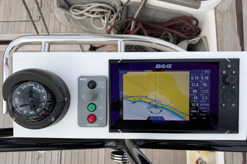 Yacht Photos Pics Cockpit navigation panel of 2018 X-Yachts X4.9 with compass and B&G display.
