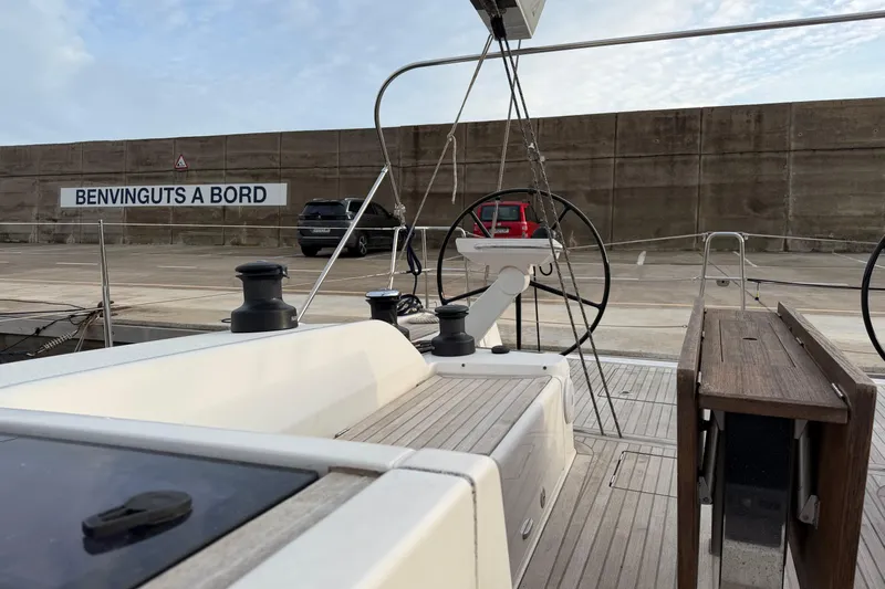  Yacht Photos Pics 2018 X-Yachts X4.9 yacht deck with "Benvinguts a Bord" sign in marina.