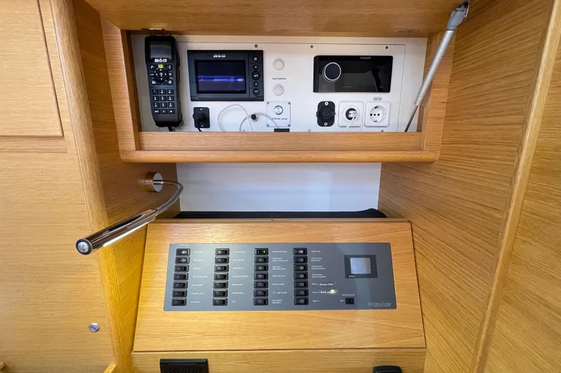  Yacht Photos Pics Control panel of 2018 X-Yachts X4.9, featuring navigation and electrical systems.