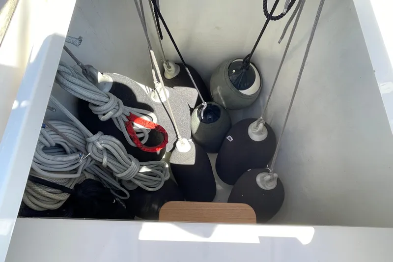  Yacht Photos Pics Storage compartment of 2018 X-Yachts X4.9 with ropes and fenders.