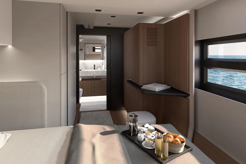  Yacht Photos Pics Luxurious Simbad 55 yacht interior with breakfast tray, ocean view, and modern bathroom.