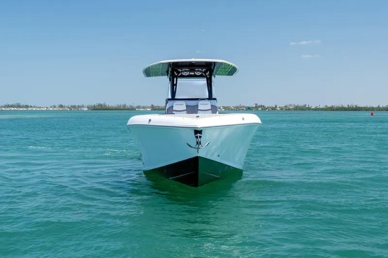 Yacht Photos Pics 2017 Statement 350 Open boat on clear blue water, front view.