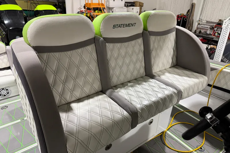  Yacht Photos Pics Luxurious seating on 2017 Statement 350 Open boat with diamond-stitched upholstery.