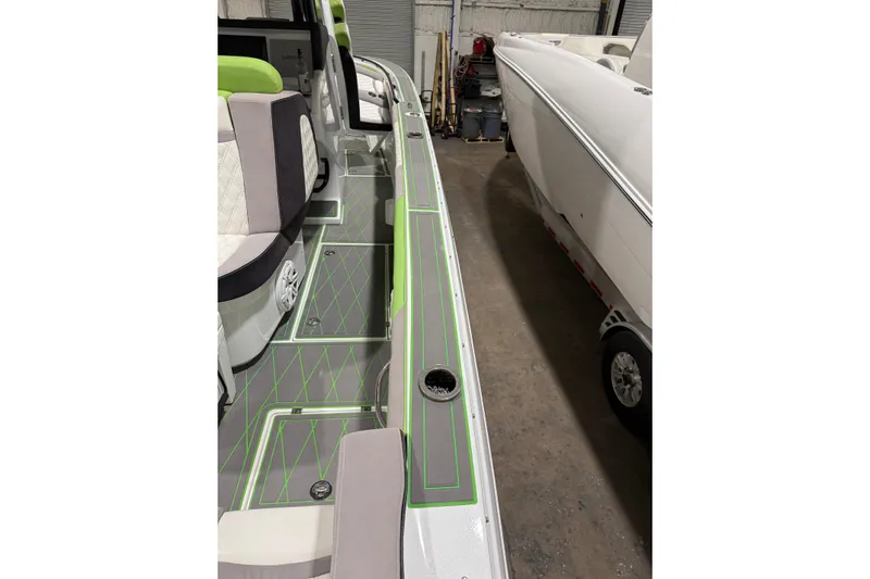  Yacht Photos Pics 2017 Statement 350 Open boat interior with green accents and seating.