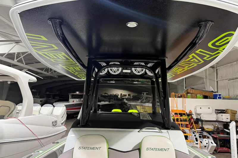  Yacht Photos Pics 2017 Statement 350 Open boat interior with custom seating and overhead design in a showroom.