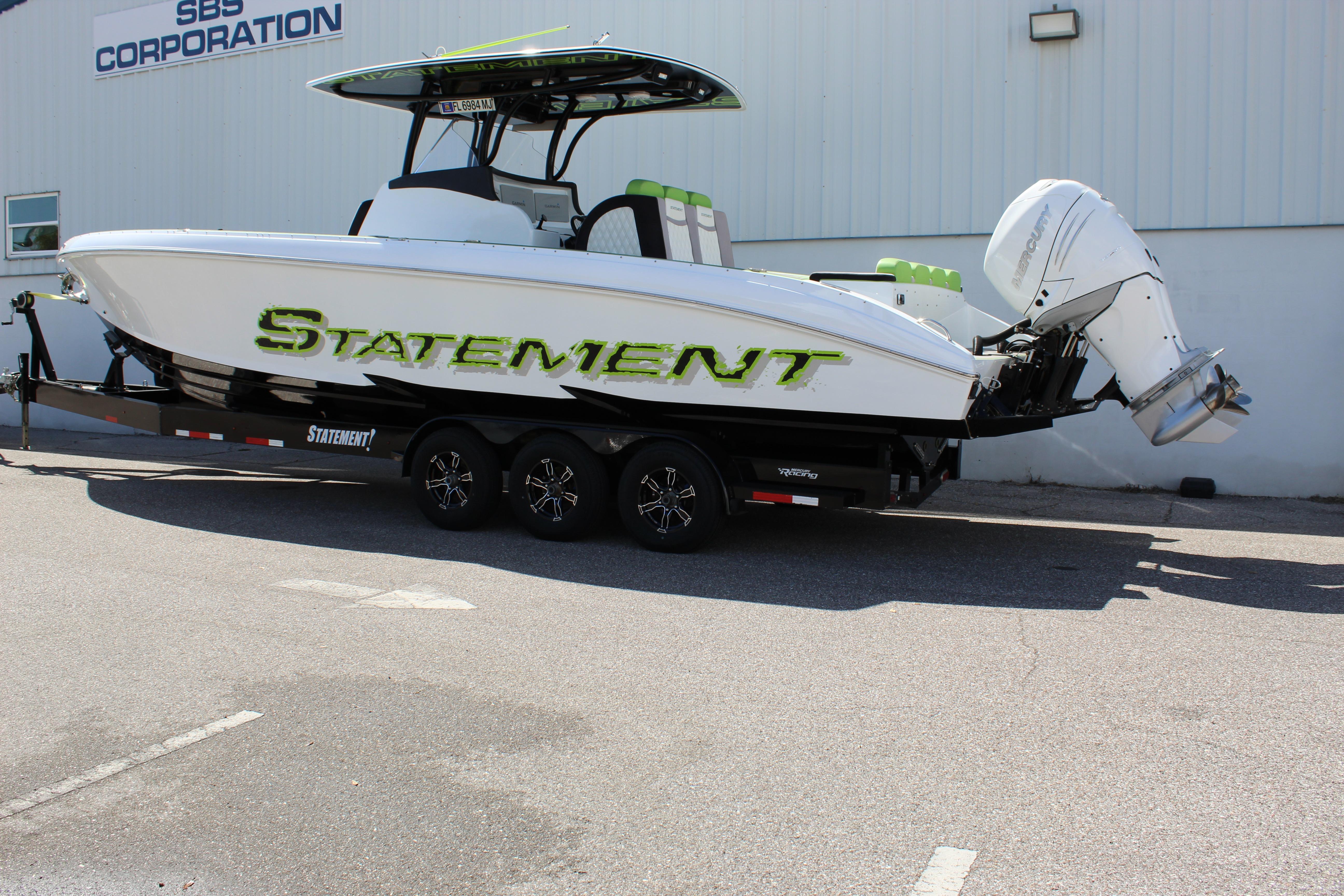 2017 Statement 350 Open boat on trailer, parked outside SBS Corporation building.
