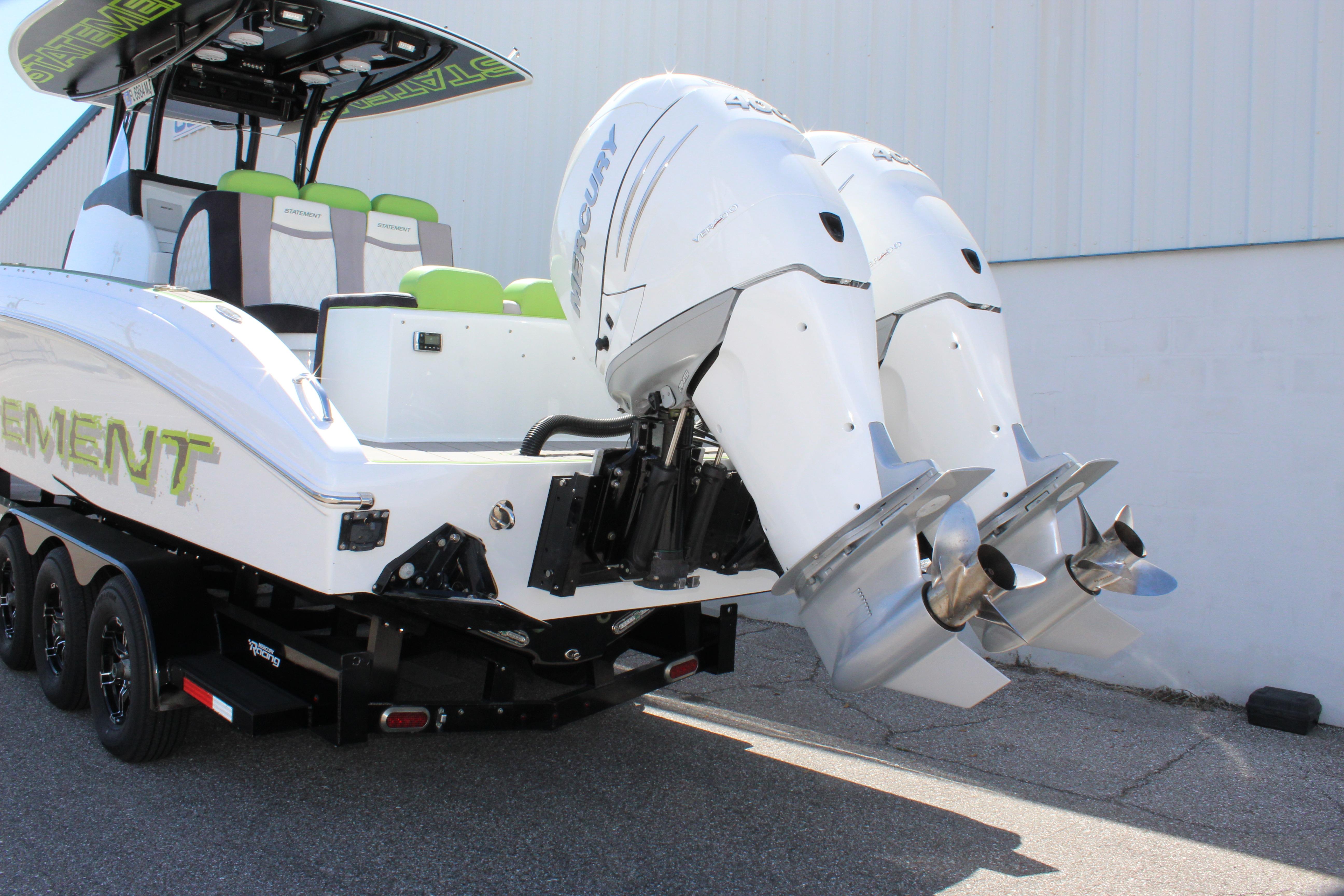 2017 Statement 350 Open boat with dual Mercury outboard engines on a trailer.