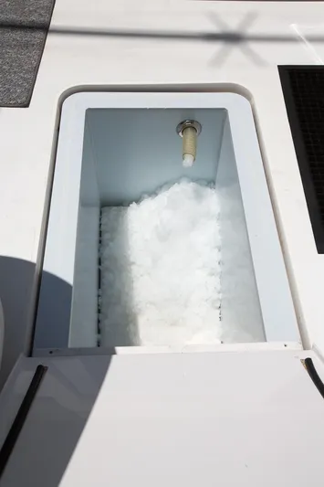  Yacht Photos Pics Ice storage compartment on 2000 Viking 50 Convertible Sport Fisher boat.