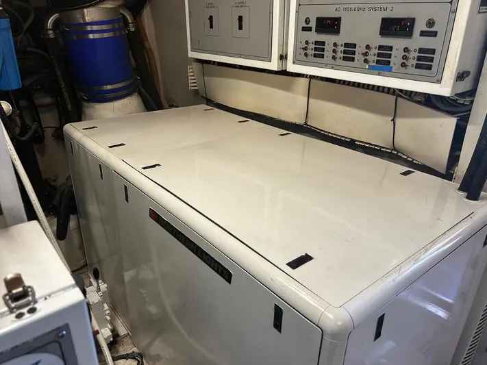 Sue Carolyn Yacht Photos Pics Engine room of 2003 Hargrave Sky Lounge yacht with control panels and equipment.