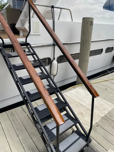 Sue Carolyn Yacht Photos Pics Staircase leading to 2003 Hargrave Sky Lounge yacht docked at marina.
