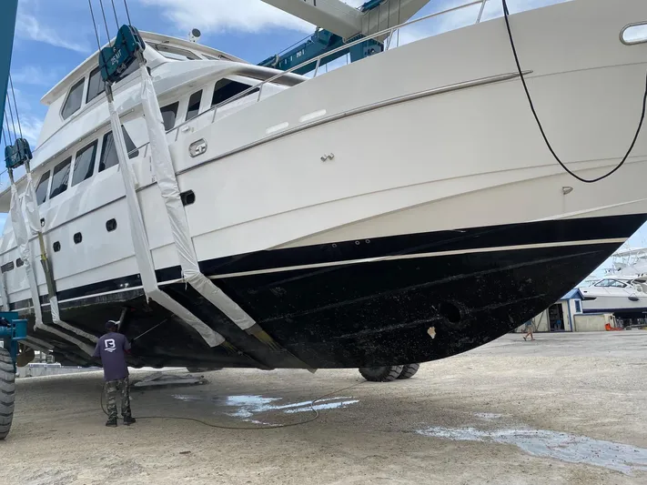 Sue Carolyn Yacht Photos Pics 2003 Hargrave Sky Lounge yacht being lifted for maintenance.