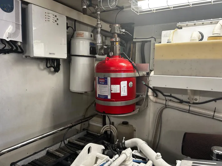 Sue Carolyn Yacht Photos Pics Engine room of 2003 Hargrave Sky Lounge yacht with fire suppression system.