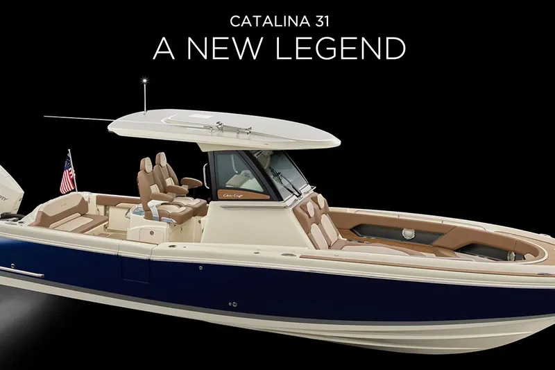  Yacht Photos Pics 2026 Chris-Craft Catalina 31 boat, sleek design, luxurious seating, "A New Legend" tagline.