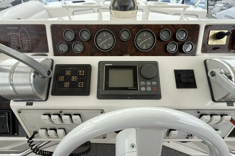  Yacht Photos Pics Control panel of a 1995 Sea Ray 550 Sedan Bridge yacht with gauges and navigation equipment.