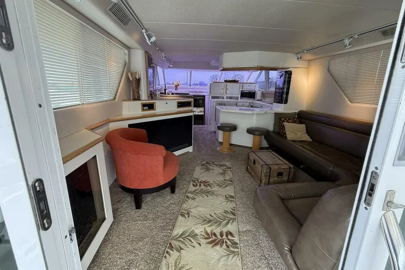  Yacht Photos Pics Luxurious interior of 1995 Sea Ray 550 Sedan Bridge yacht with modern furnishings.