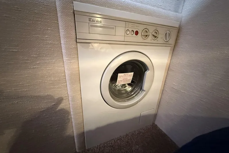  Yacht Photos Pics Built-in washing machine on a 1995 Sea Ray 550 Sedan Bridge yacht.