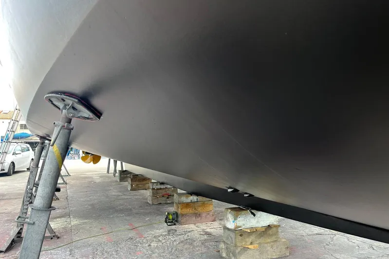 Perseus Yacht Photos Pics Bottom view of a 2004 Fleming 75 yacht on dry dock supports.