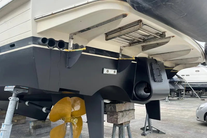 Perseus Yacht Photos Pics Stern view of 2004 Fleming 75 yacht with propeller and rudder visible.