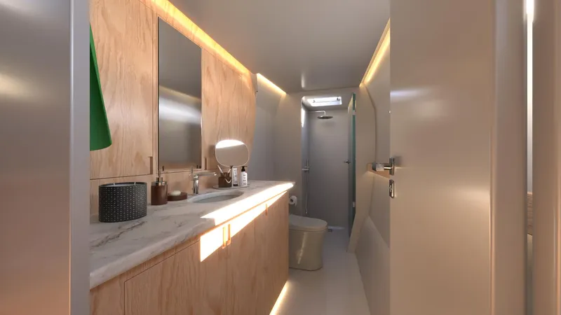  Yacht Photos Pics Modern bathroom in 2025 Ocean Renegade R6 yacht with wooden cabinetry and sleek fixtures.