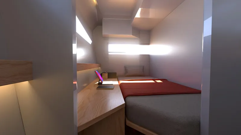  Yacht Photos Pics Modern cabin interior of Ocean Renegade R6 2025 with cozy bed and wooden desk.