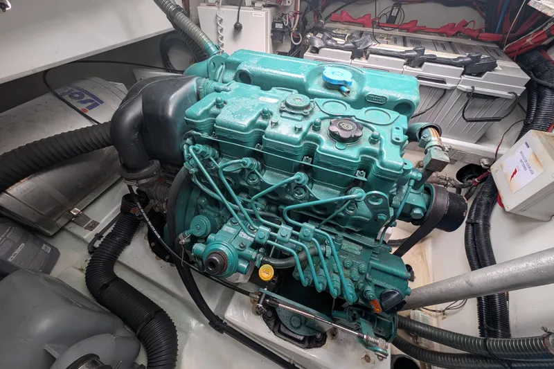 Maho Yacht Photos Pics Engine room of 2021 Fountaine Pajot Astrea 42 Catamaran, featuring a green marine engine.