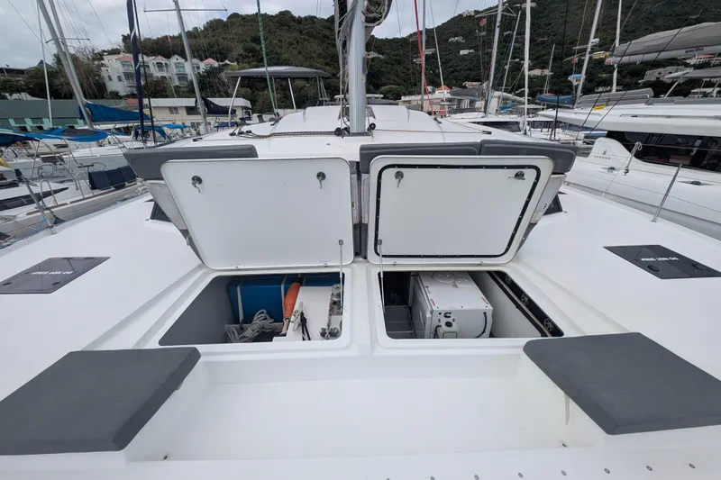 Maho Yacht Photos Pics 2021 Fountaine Pajot Astrea 42 Catamaran deck with open storage compartments.