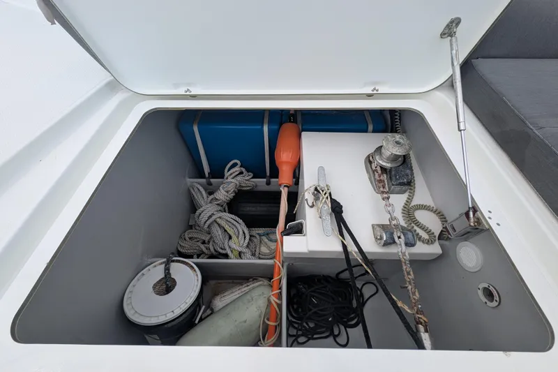 Maho Yacht Photos Pics Storage compartment of 2021 Fountaine Pajot Astrea 42 Catamaran with ropes and equipment.
