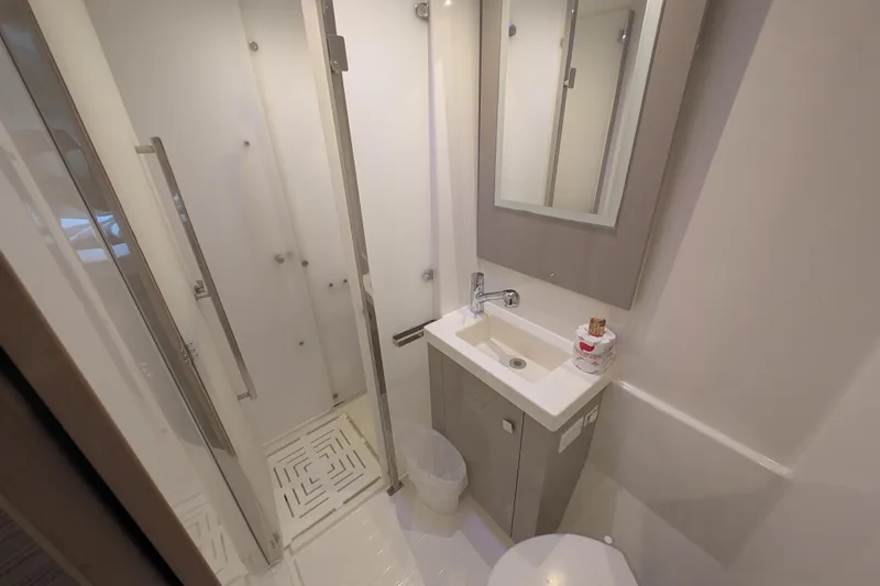 Maho Yacht Photos Pics Modern bathroom in 2021 Fountaine Pajot Astrea 42 Catamaran with shower and sink.