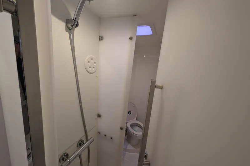 Maho Yacht Photos Pics Bathroom interior of 2021 Fountaine Pajot Astrea 42 Catamaran with shower and toilet.