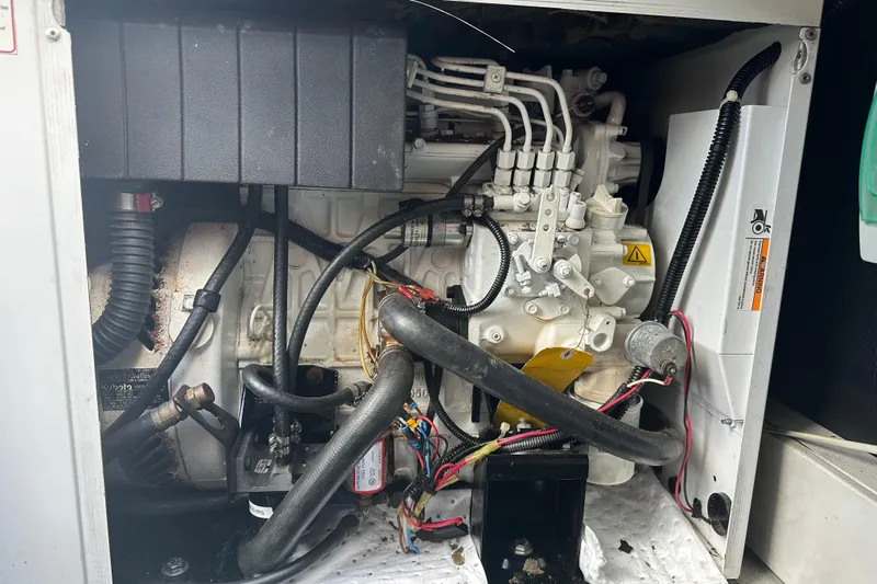 Maho Yacht Photos Pics Engine compartment of a 2021 Fountaine Pajot Astrea 42 Catamaran, showcasing mechanical components.