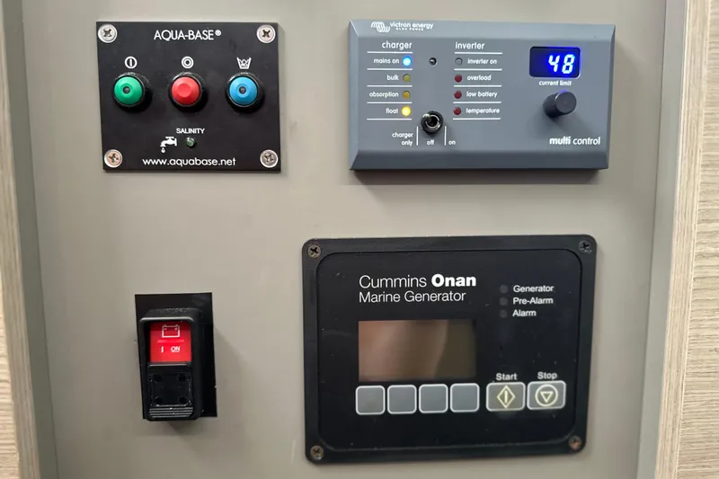 Maho Yacht Photos Pics Control panel of 2021 Fountaine Pajot Astrea 42 Catamaran with generator and inverter settings.