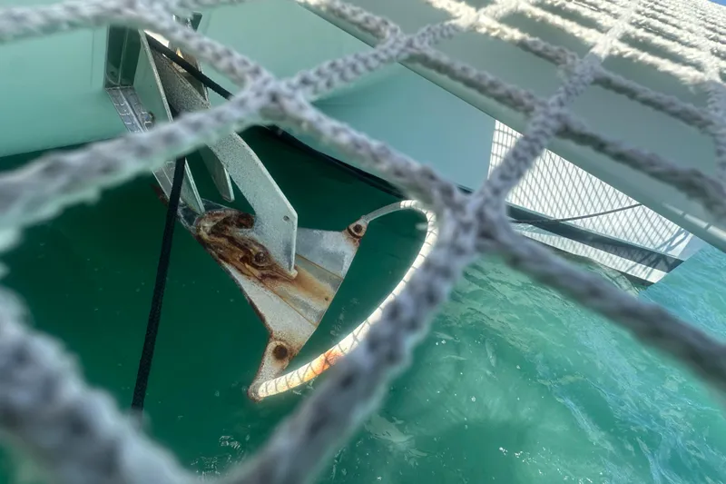 Maho Yacht Photos Pics Anchor of 2021 Fountaine Pajot Astrea 42 Catamaran submerged in turquoise water.